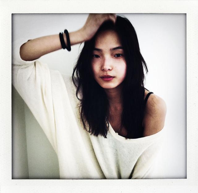 The fast rising Xiao Wen  at IMG flows effortlessly with the standard  runway ideal.
